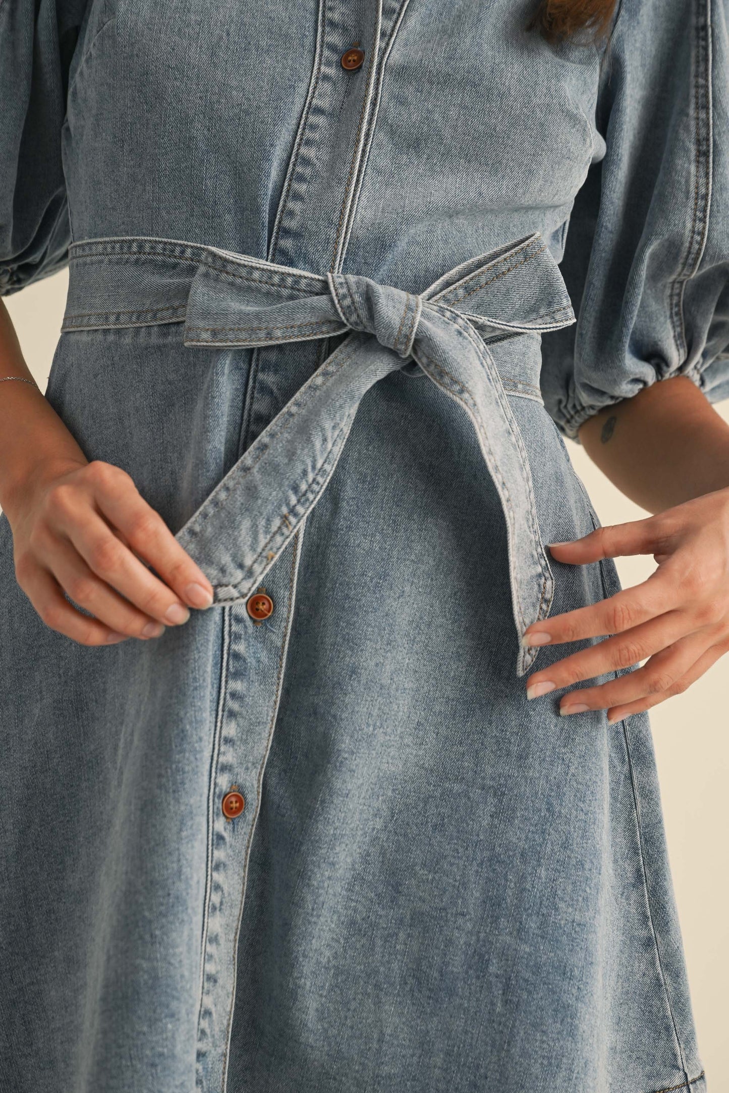 DENIM BOW PUFF SLEEVE FIT AND FLARE MINI DRESS